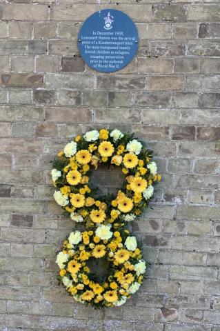Plaque and wreath